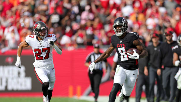 Oct 22, 2023; Tampa, Florida, USA; Atlanta Falcons tight end Kyle Pitts (8) is chased out of bounds by Tampa Bay Buccaneers cornerback Zyon McCollum (27) in the fourth quarter at Raymond James Stadium.